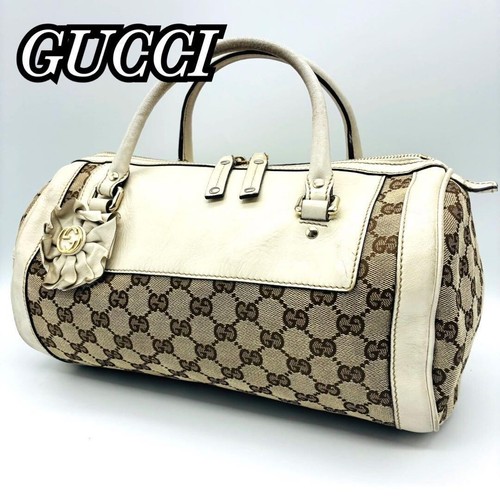 Gucci canvas leather duffle - gucci,